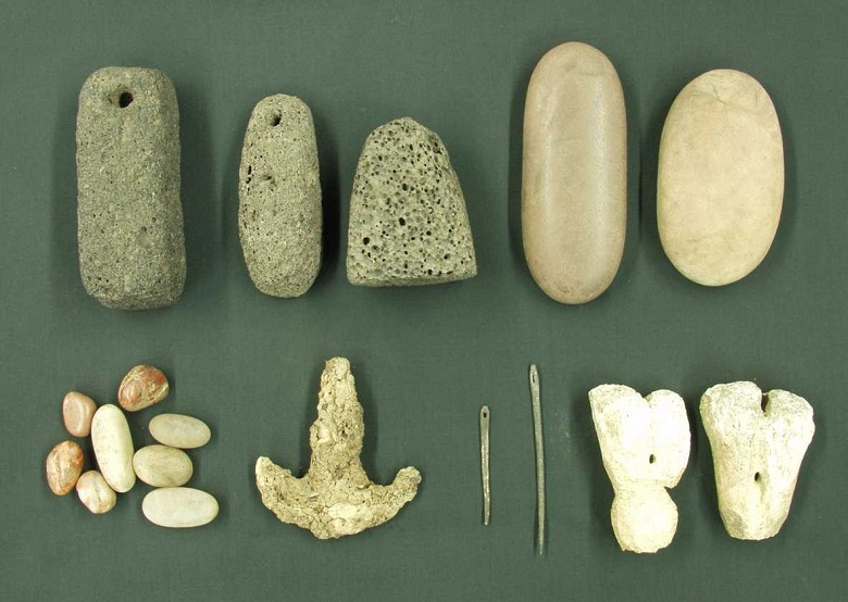 A selection of archaeological finds including stone markers