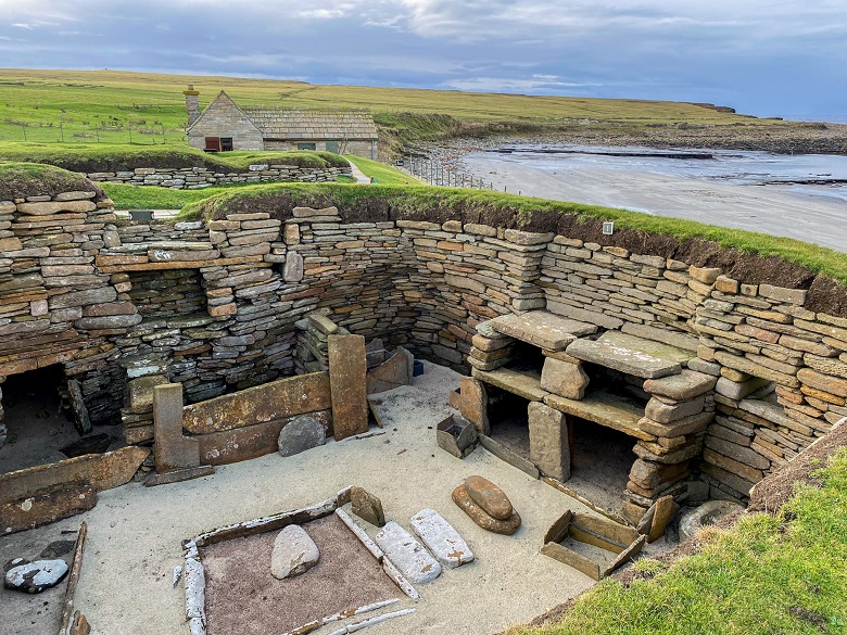 A stone neolithic house covered in turf 