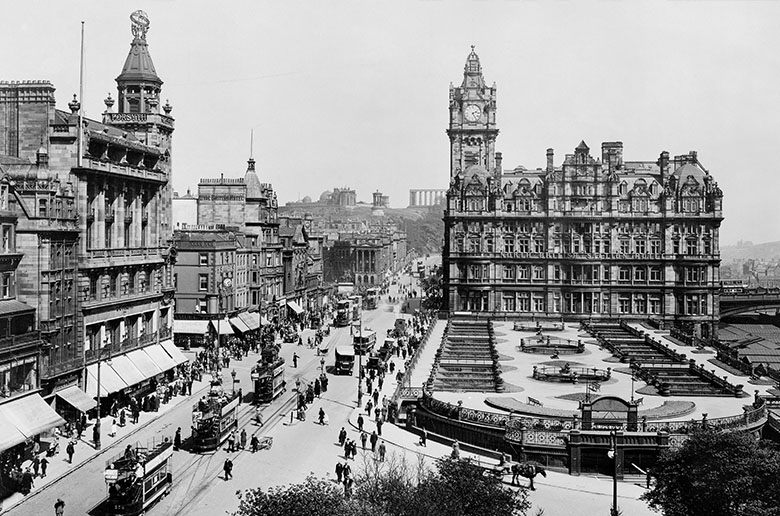 archive photo of the East End of Princes Street taken from the Scott monument at an elevated angle. Waverley Station, The North British Hotel and Forsyth's all feature.Forsyth's hotel 