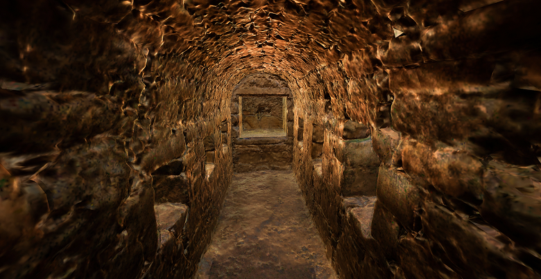 A barrel vaulted room, with niches in the wall. It looks small and claustrophobic.