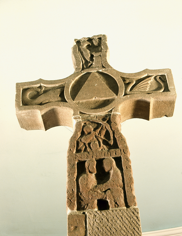 A large stone cross with intricate carvings 