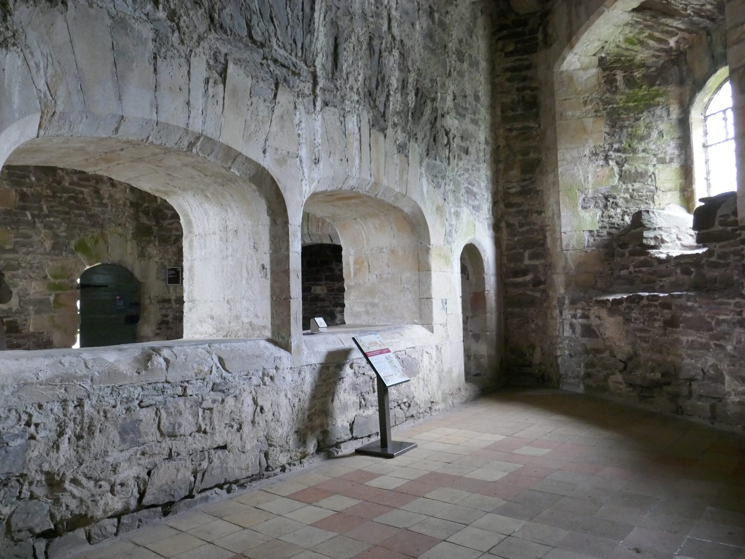 The space where the kitchen would have been with *its arched windows at Doune Castle.
