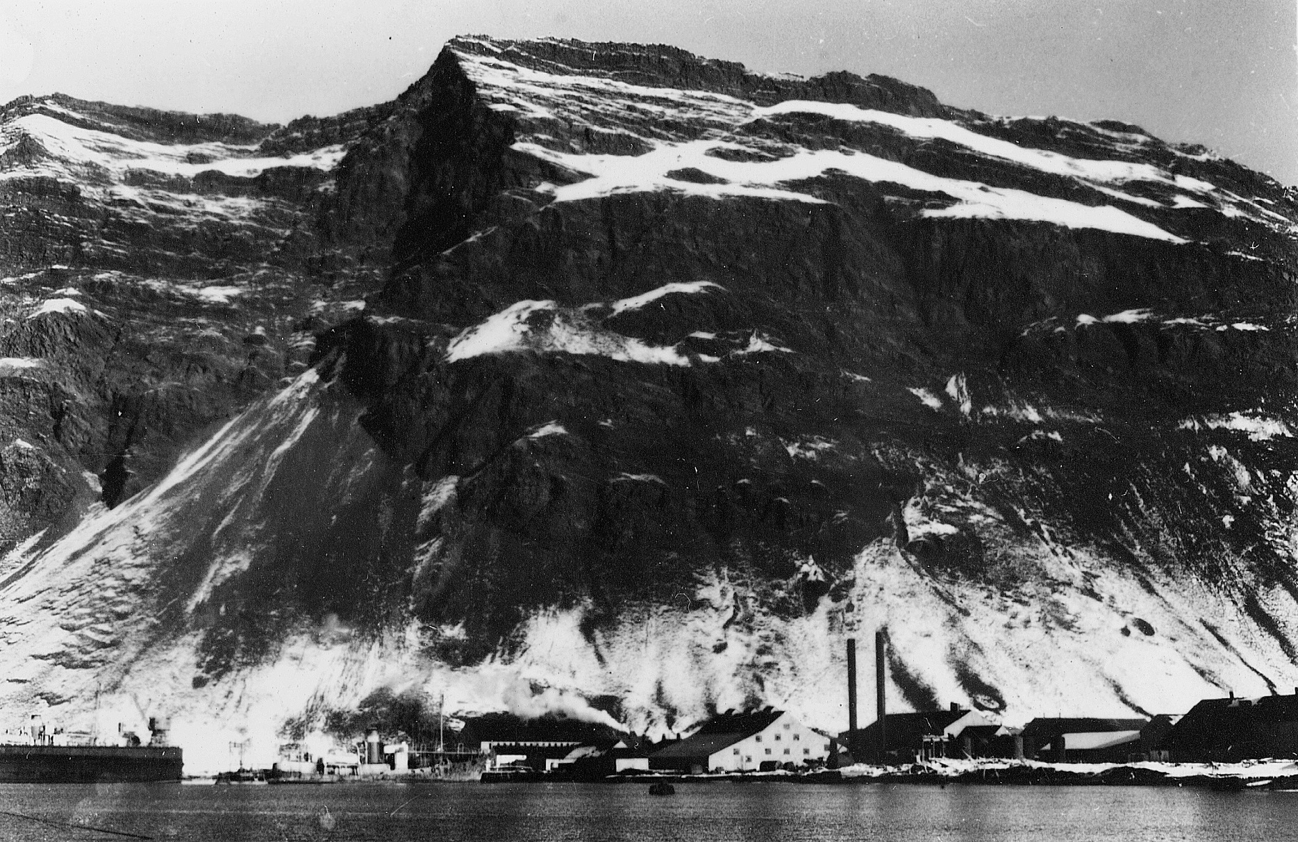 Black and white archive photo showing ice covered hills