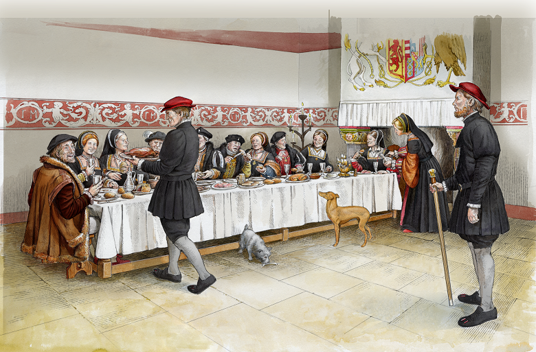 A colour illustration of a medieval banquet inside a castle. The guests are sitting down one side of a long wooden trestle table while servants dressed in black bring them more food. Two dogs are angling for scraps of food.