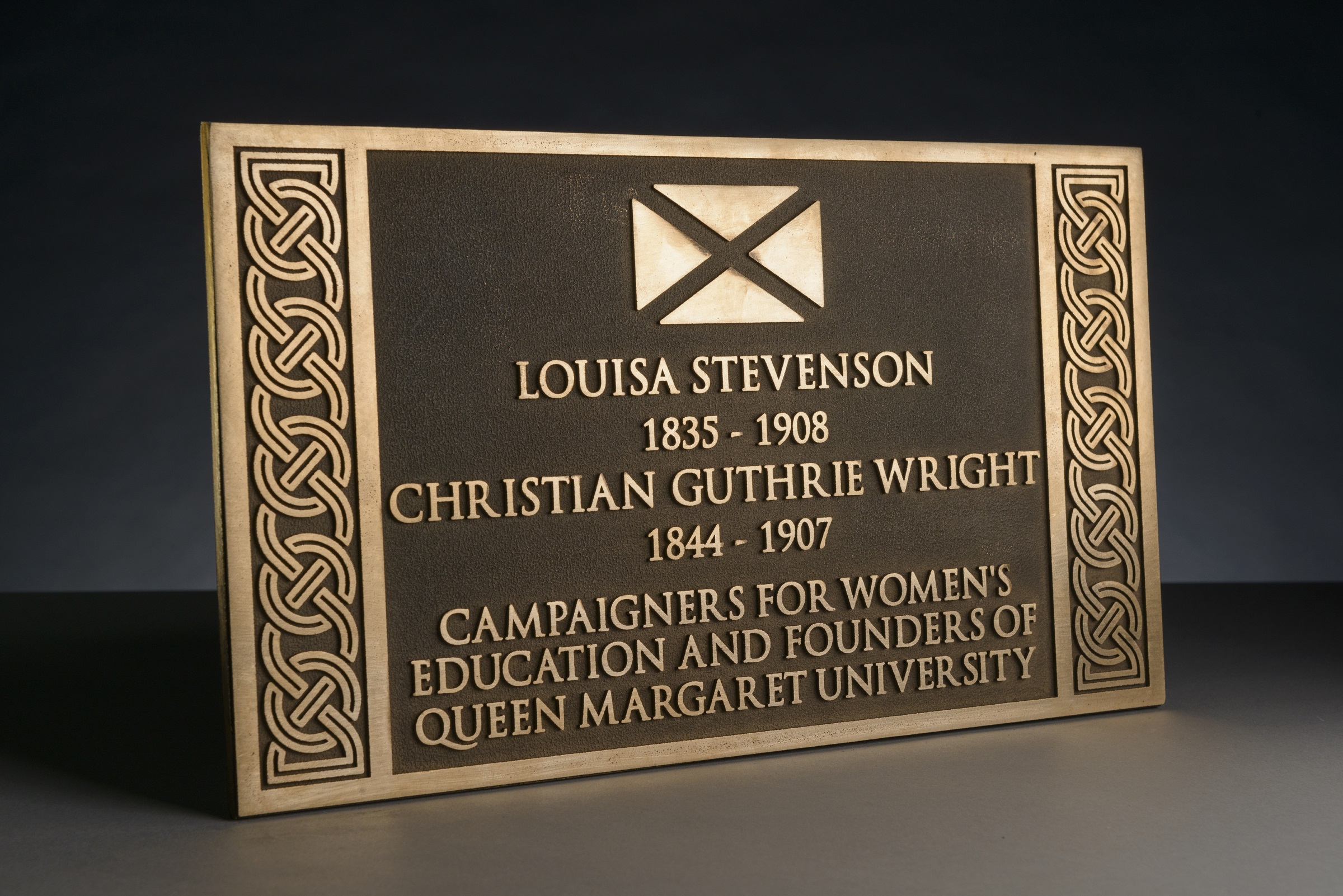 A shiny commemorative plaque for ouisa Stevenson, 1835-1908 and Christian Guthrie Wright, 1844-1907.