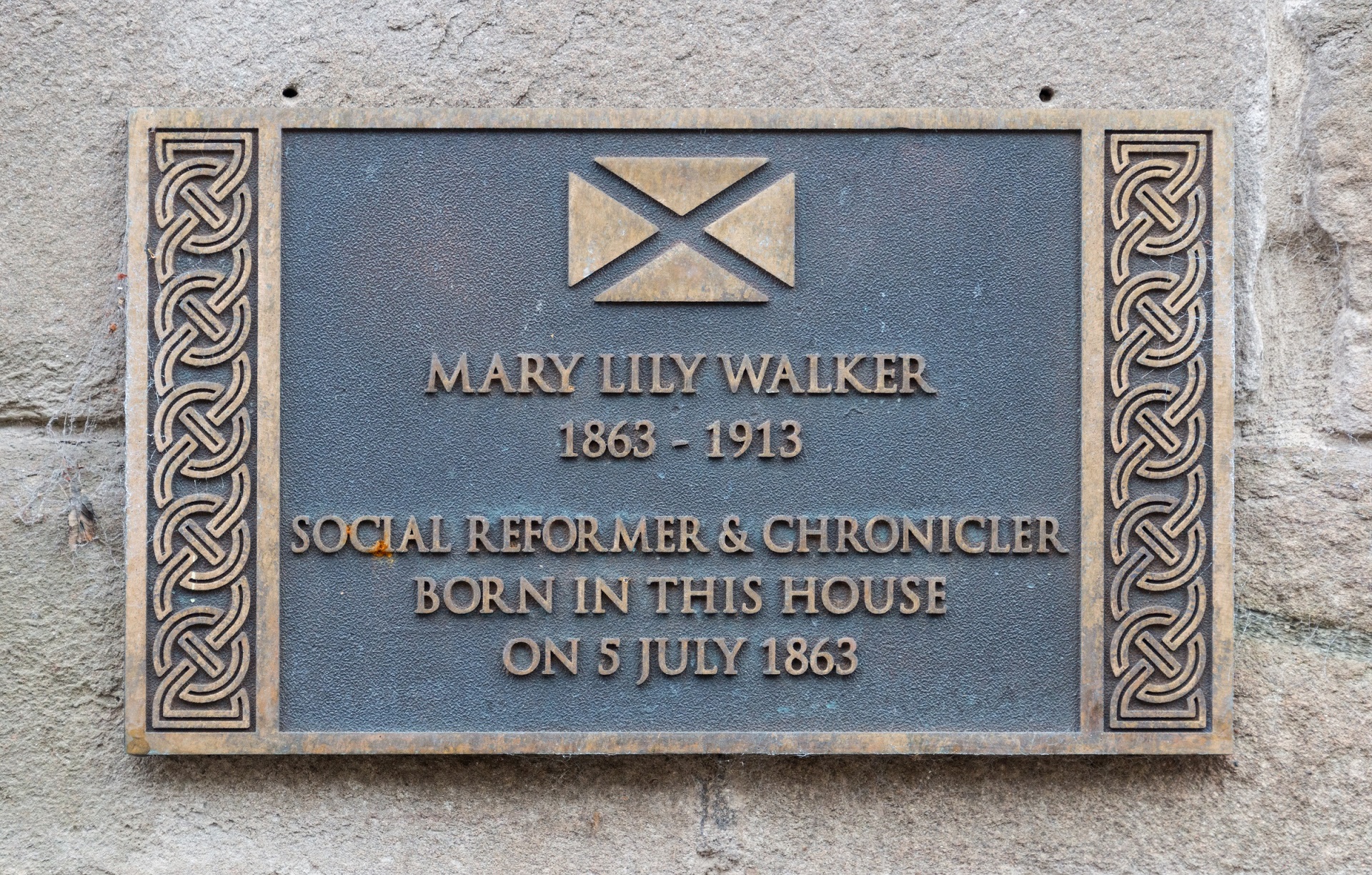 Close up of a plaque for Mary Lily Walker