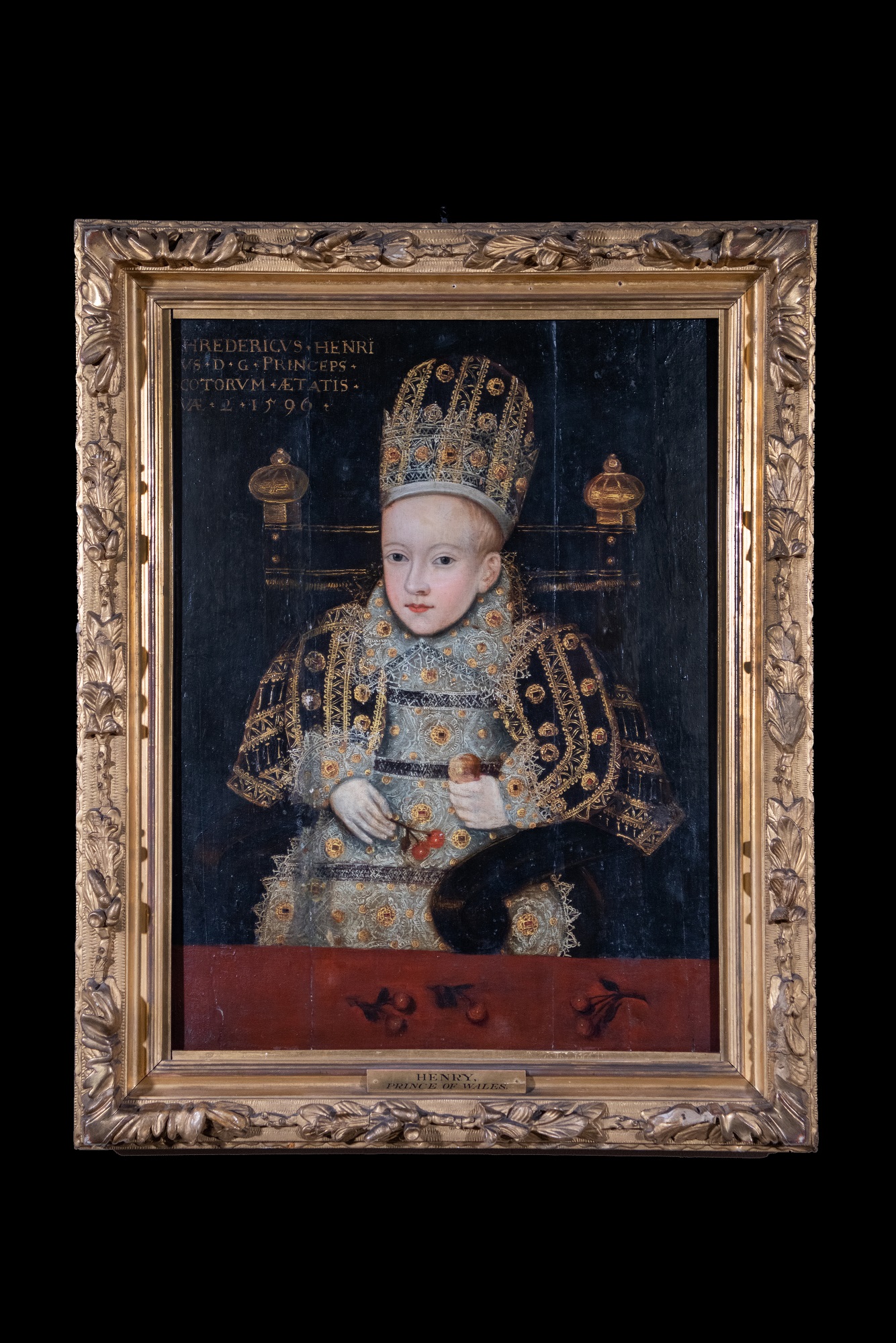 Portrait of Prince Henry, aged 2, dated 1596. The portrait is in a decorated, gold frame