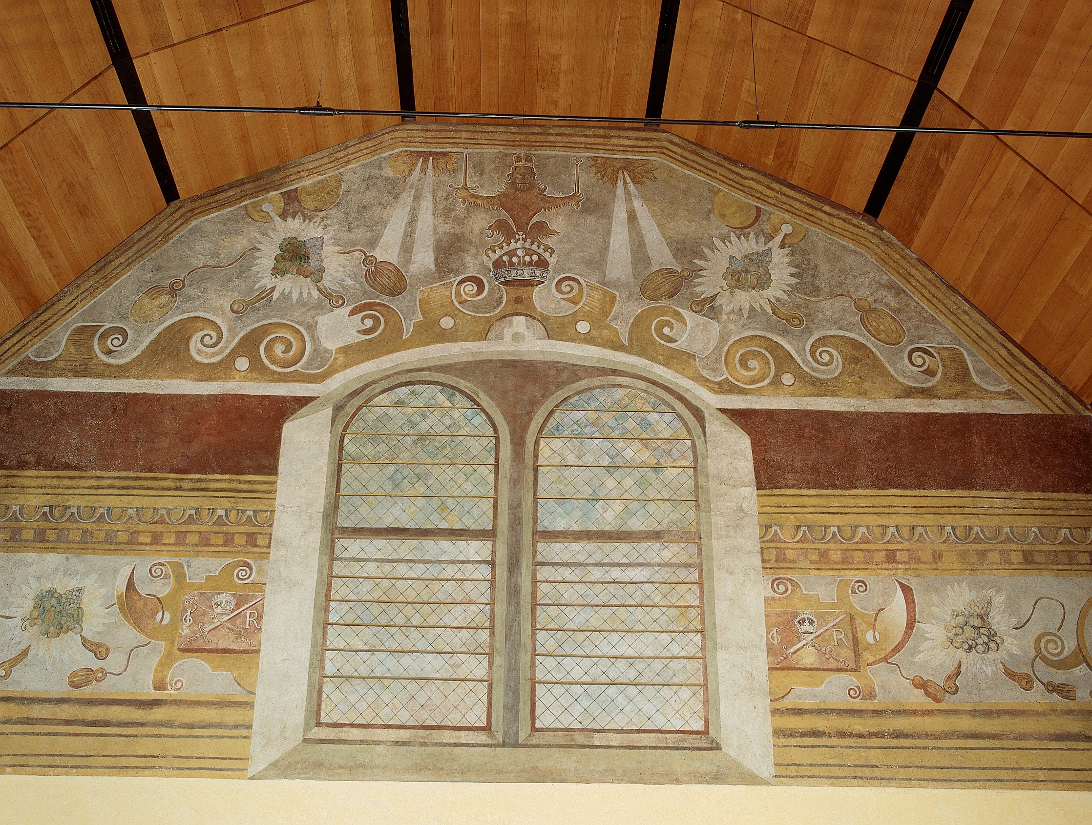 Close up of the chapel interior showing the painted ceiling and window