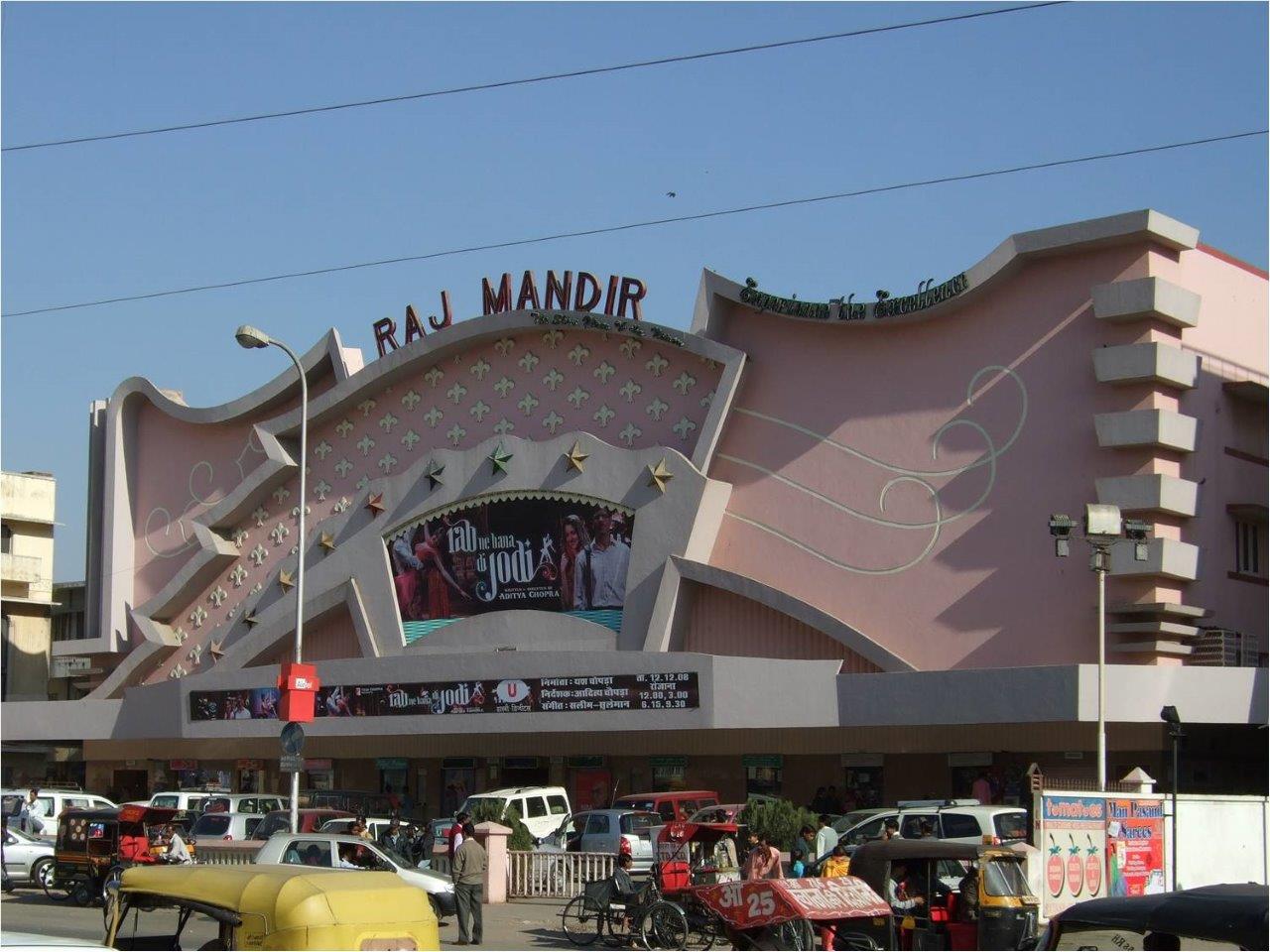 Archive photo of the Raj Mandir Cinema in Jaipur. It's a big colourful building with whimsical lines and it's pink!