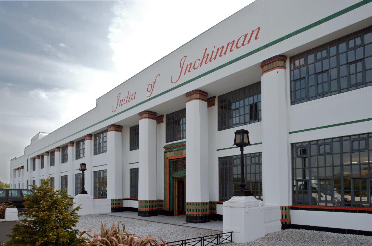 Slanted view of India of Inchinnan. it has the name in cursive red letters at the top. There are many Art Deco details.