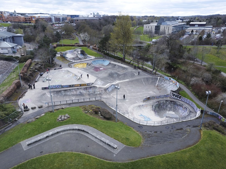 An aerial view of Livingston Skate Park. It's an area of formed concrete with lots of interesting shapes for skaters to enjoy.