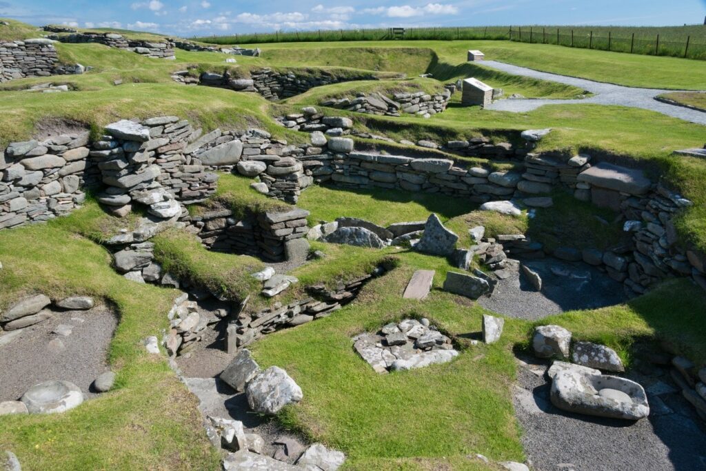 Remains of a Norse settlement. You can see dug out ground with stone walls.