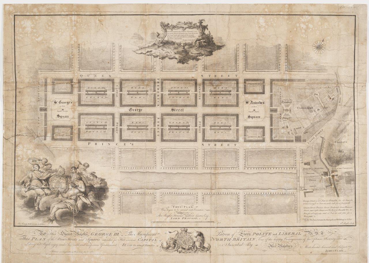 Black and white historic map with streets and squares in a grid pattern.