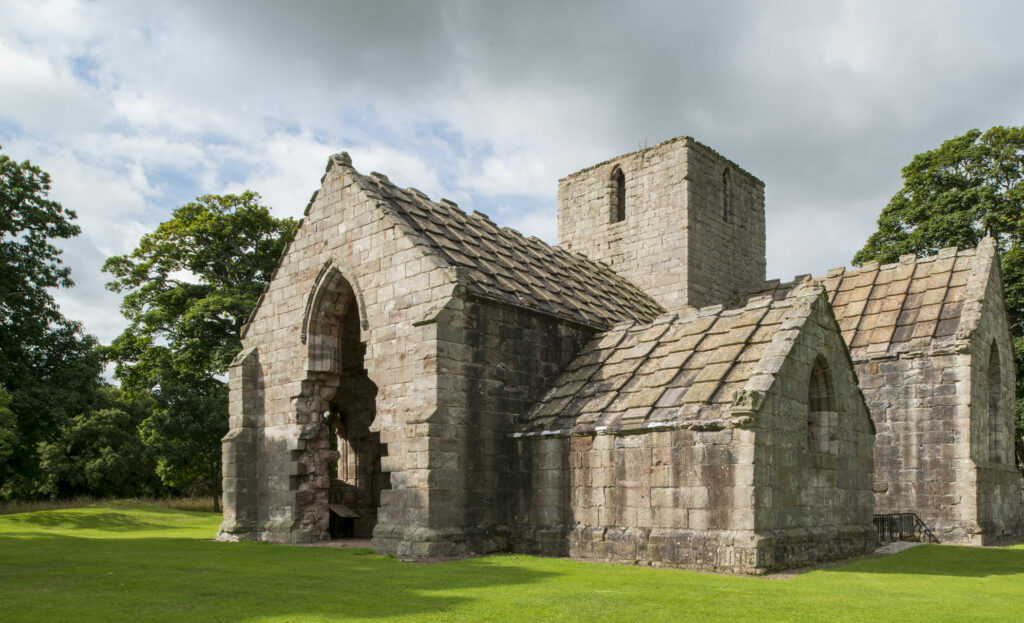 A photo of the ecterior or Dunglass Collegiate Church on a grey day