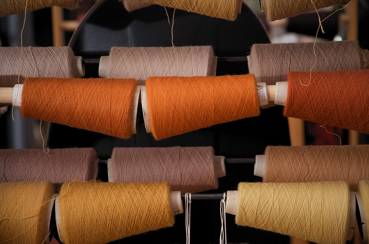 lots of rolls of different coloured thread