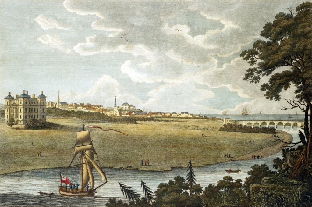 Historic landscape painting showing Duff House on the left, a wide open riverside landscape, people walking on the shore, and a sailing boat in the foreground, with a long arched bridge and a distant town under a bright, cloudy sky.