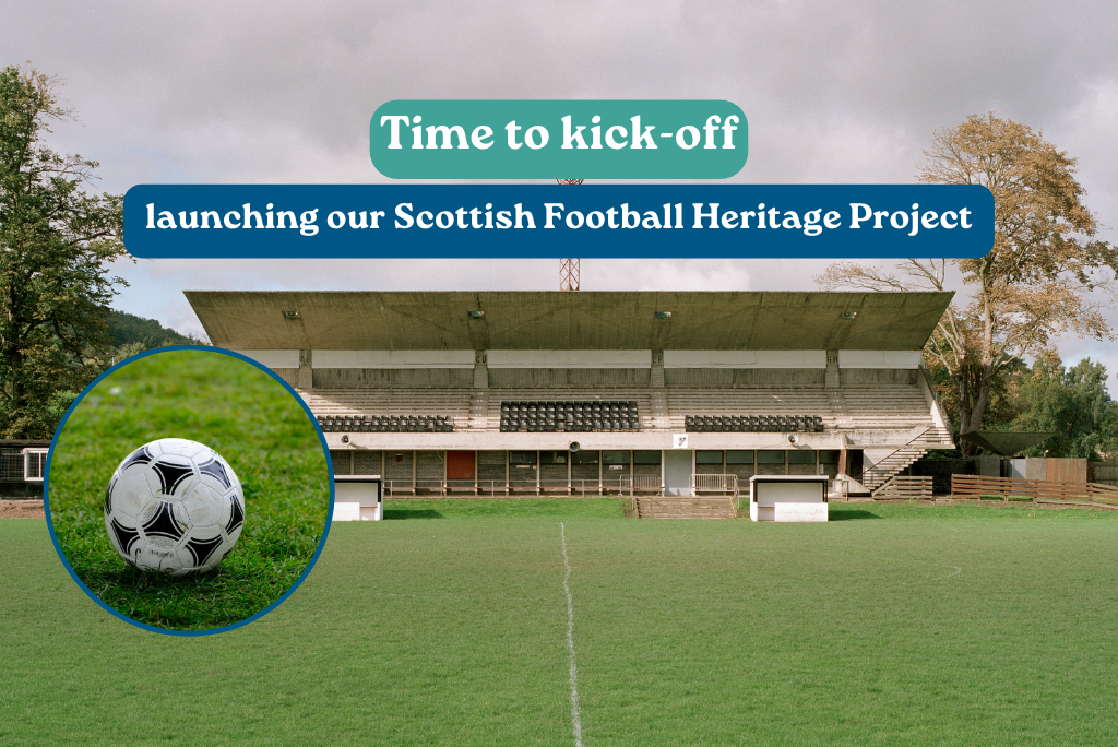 Front view of a small covered football stand facing a grass pitch, with rows of seats, floodlight tower and trees under a cloudy sky. Text reads: Time to kick-off, launching our Scottish Football Heritage Project.
